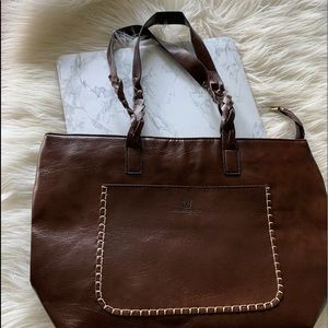 Brown leather Weimeibaige bag
